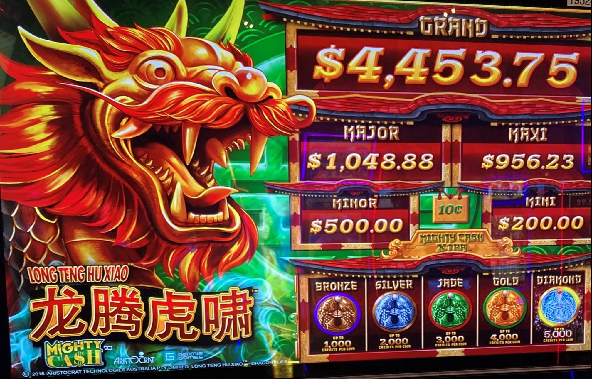 progressive slot machine with cash prizes, $4,453.75 grand jackpot